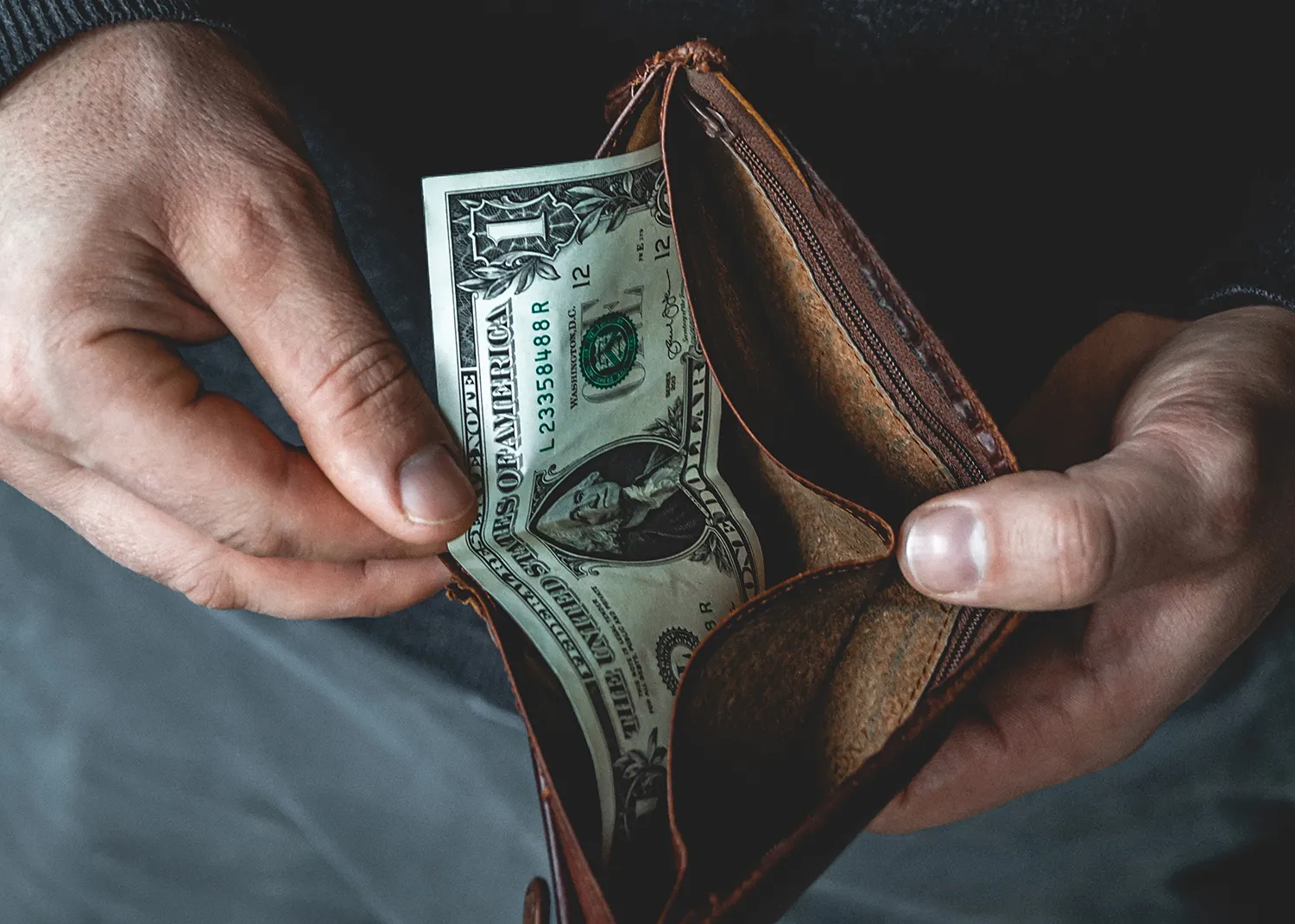empty-wallet-hands-young-man