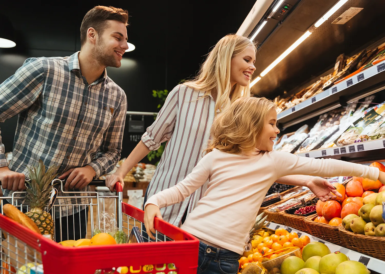happy-family-with-child-shopping-cart-buying-food
